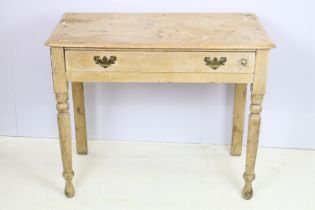 19th Century Victorian pine side table having rectangular top above single drawer with twin