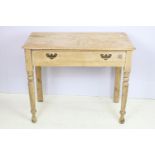 19th Century Victorian pine side table having rectangular top above single drawer with twin