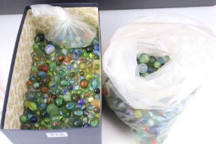 Large collection of glass marbles of varying size & colour