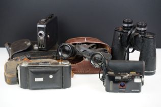 Group of cameras and binoculars to include Ensign folding bellows camera, cine Kodak eight, Swift