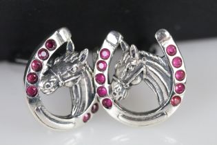 Pair of silver and ruby horse shaped cufflinks