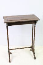 19th Century Victorian rosewood veneer side table raised on four turned column legs raised on