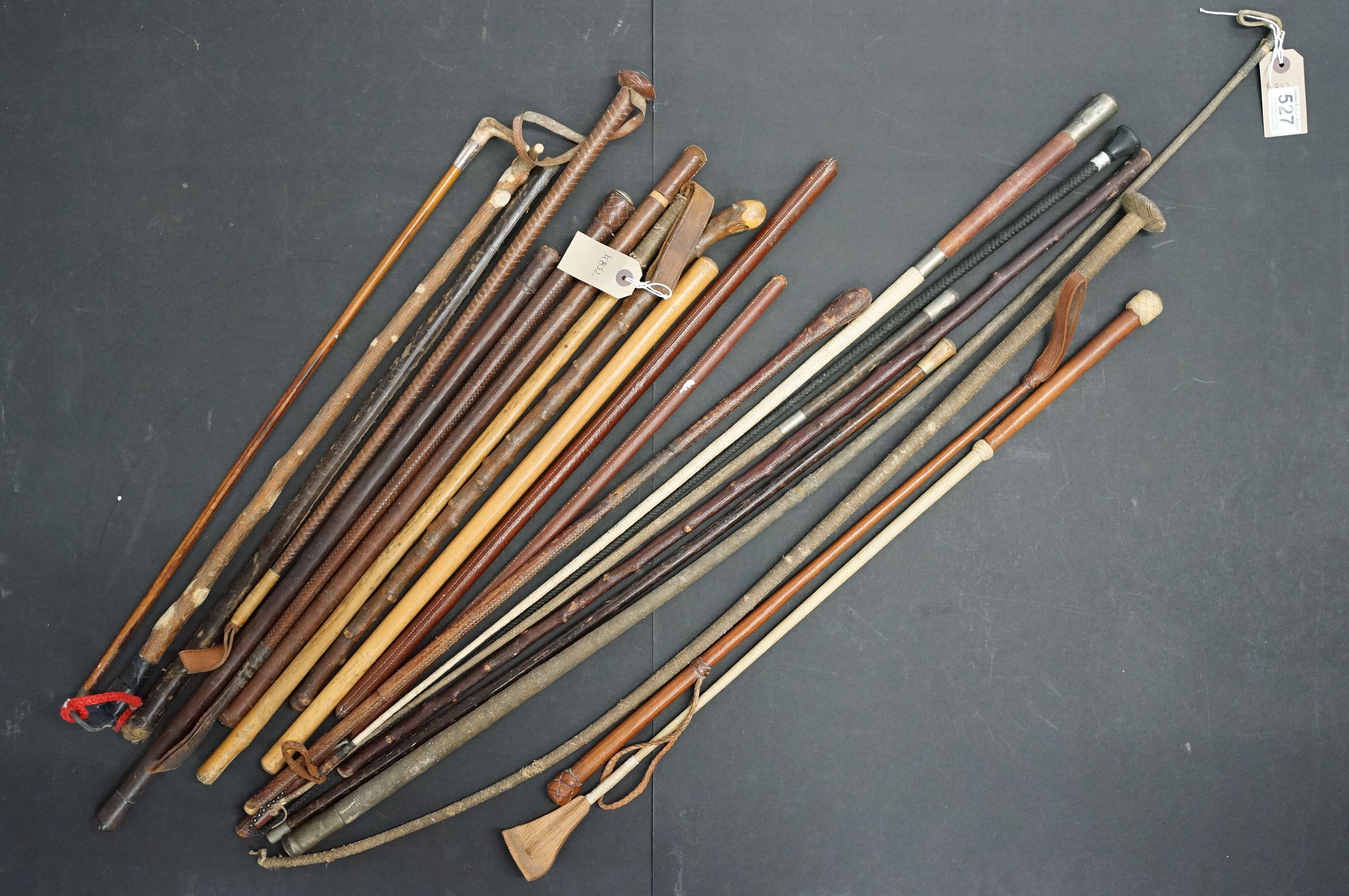 Collection of 19th Century and later riding crops and whips including military and equestrian