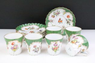 Set of six Dresden coffee cups & saucers with hand painted floral decoration and gilt details on a