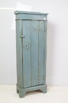 Tall narrow pine cupboard. Measures 110 x 40 x 20cm.