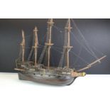 20th Century wooden boat model having hand painted details with rigging, life boats and cannons.