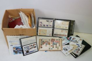 Collection of coins and stamps to include an album of world stamps spanning Victorian era to mid