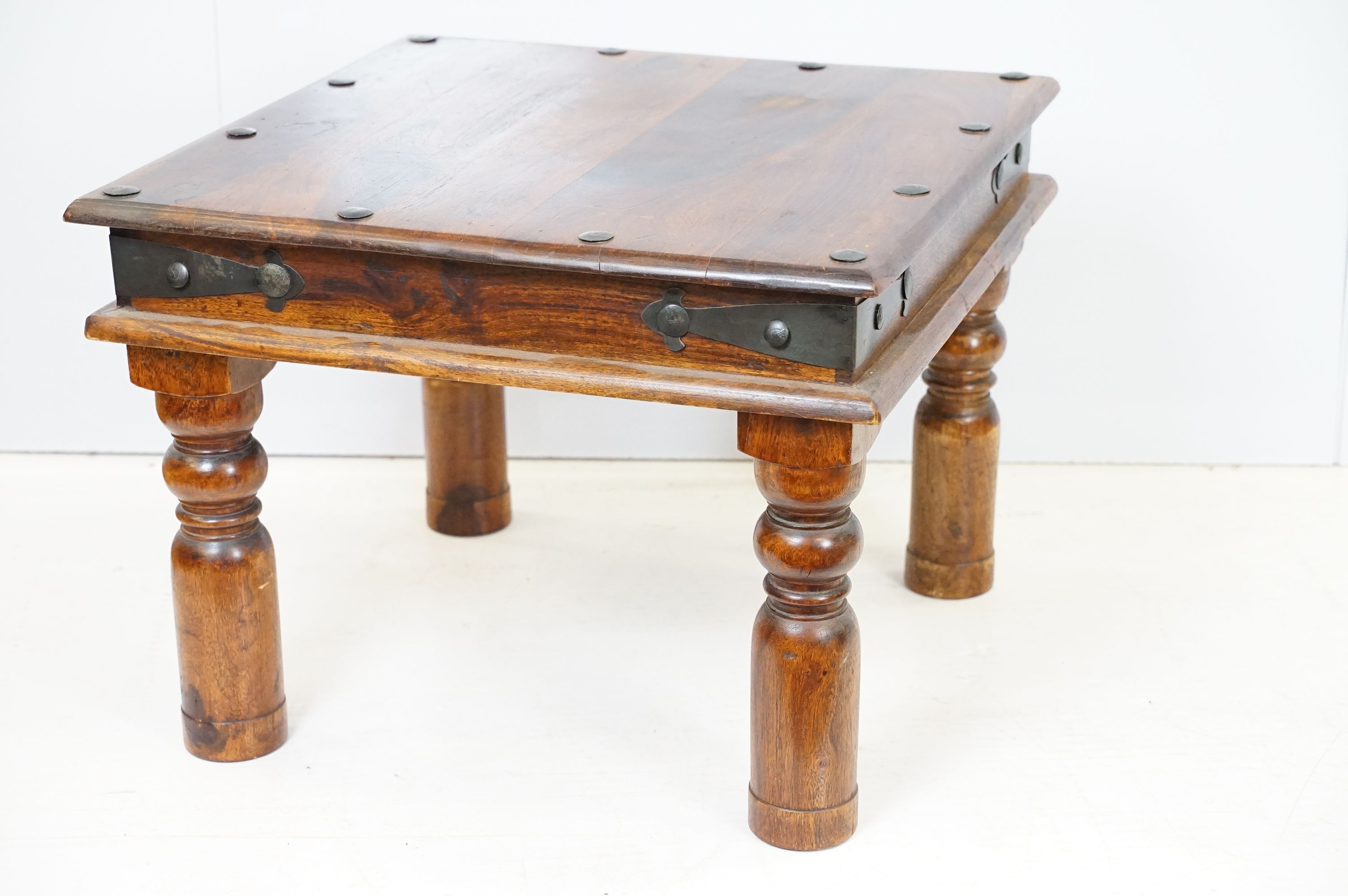 20th Century fruit wood occasional table having a flared top with block legs and metal banding.