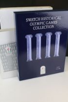 A SWATCH 1996 Atlantic olympic games watch collection within original packaging.