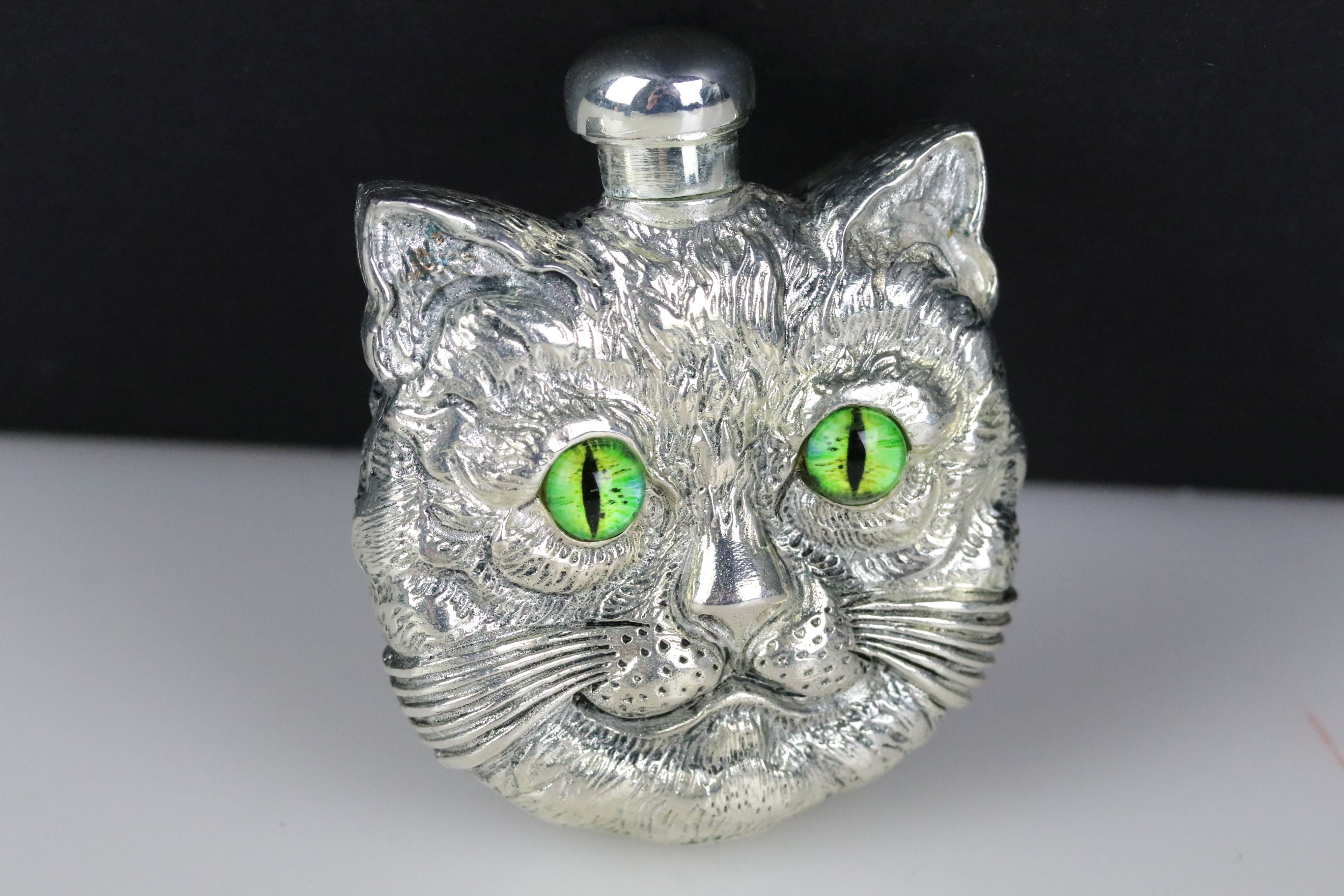 Interesting perfume bottle in the Louis Wain style, stamped 800