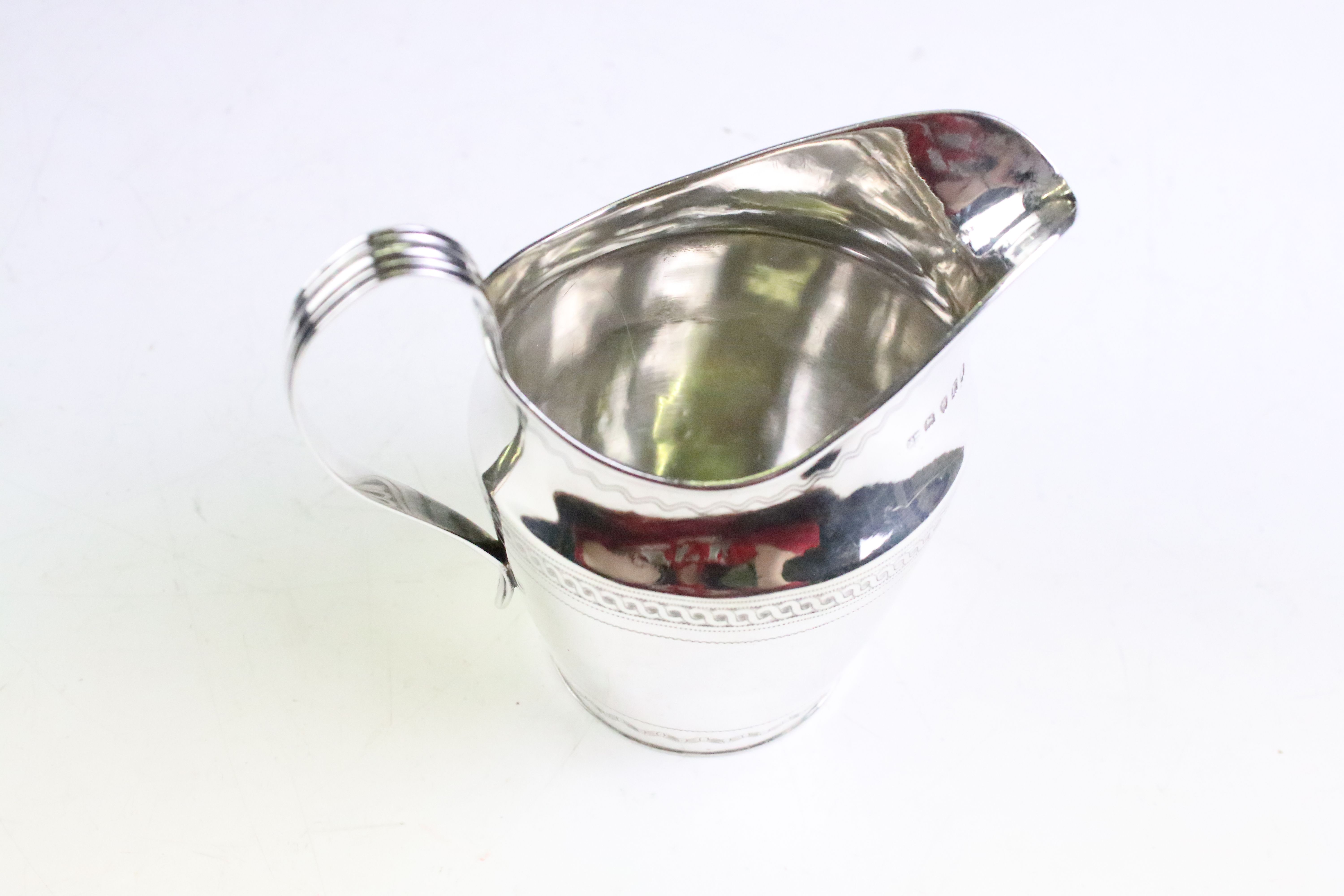 George III silver milk / cream jug with bright cut banding decoration and high loop reeded handle, - Image 2 of 4