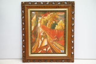 An ornate framed Impressionist oil painting of a village set in woodland scene with woman and and