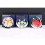 Three Moorcroft small shallow dishes, comprising: Indigo pattern, 12cm diameter, boxed, Windrush,