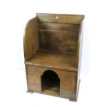 Late 19th Century oak lambing chair with kennel below