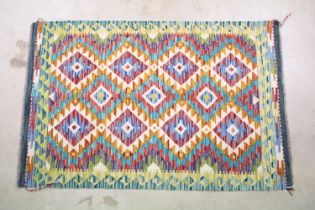 Hand knotted woollen Chobi Kilim rug, 150cm long x 100cm wide