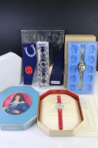 A collection of three SWATCH wristwatches within original packaging to include the Lucky 7 example.