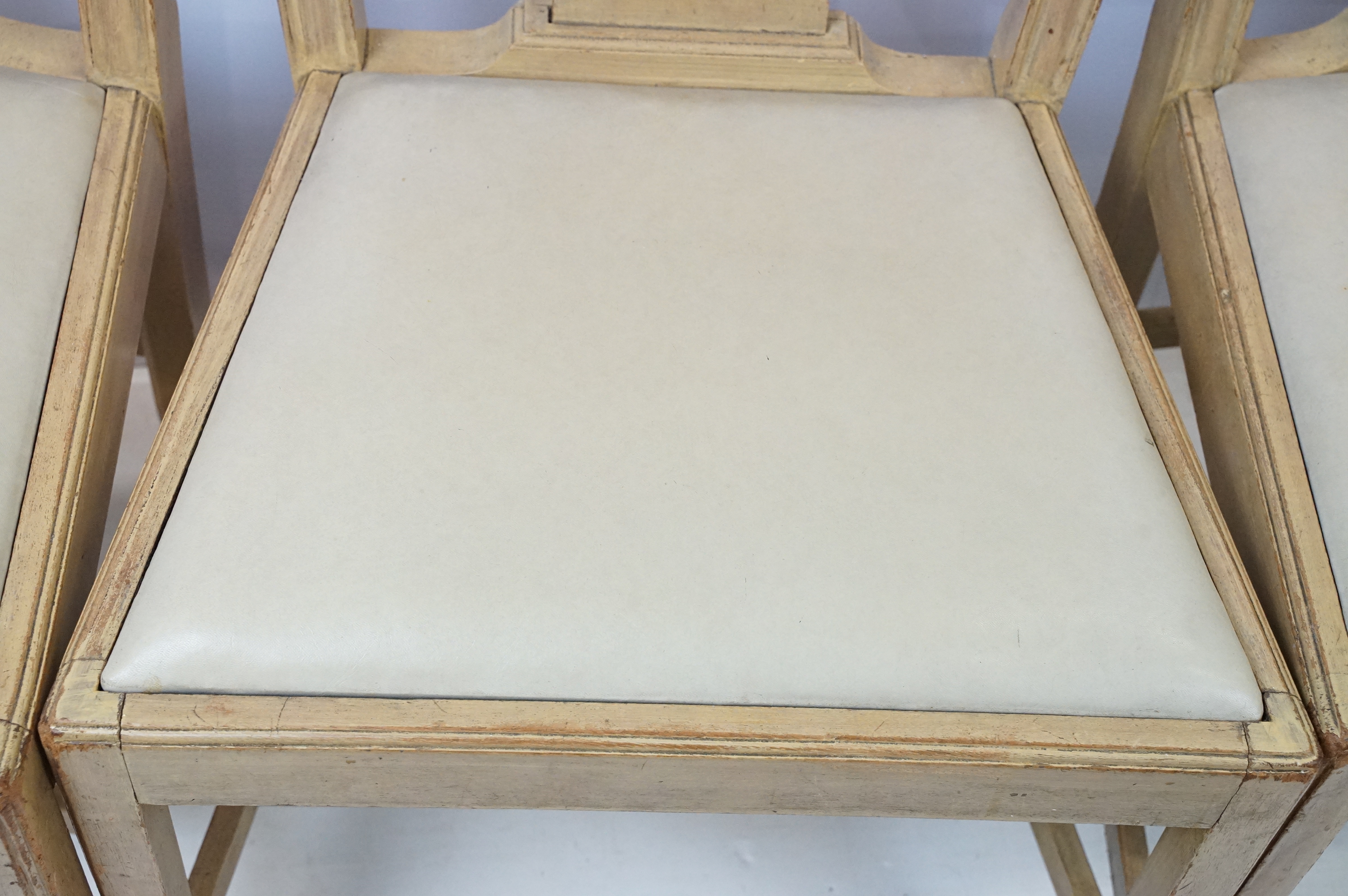 Group of four 20th Century stained oak dining chairs with cream drop in seats. - Image 3 of 9