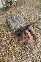 Rustic French wooden wheelbarrow with spoked iron wheel, plus a rustic wooden mallet (approx 104cm