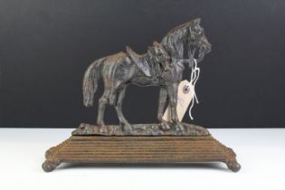 19th Century Victorian cast iron door stop in the form of a horse raised on a stepped base. Measures