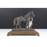 19th Century Victorian cast iron door stop in the form of a horse raised on a stepped base. Measures