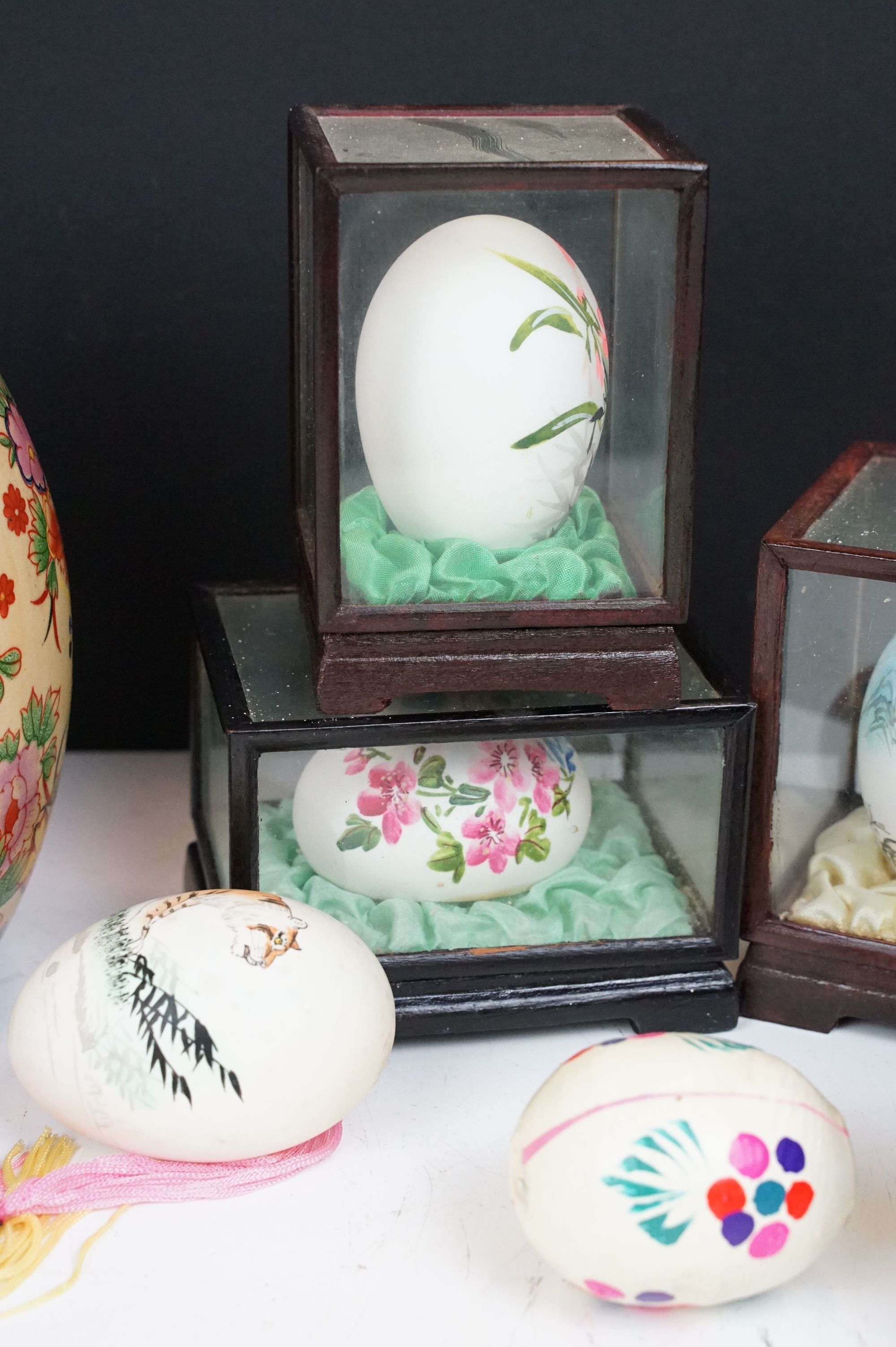 Collection of Chinese painted eggs including some in small display cases, and some ceramic examples. - Image 4 of 6