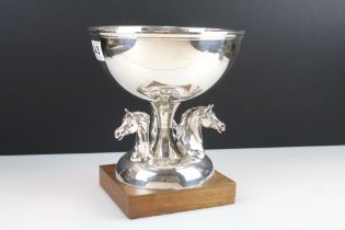 A French silver plated centre piece bowl / trophy with horse decoration mounted to wooden plinth.