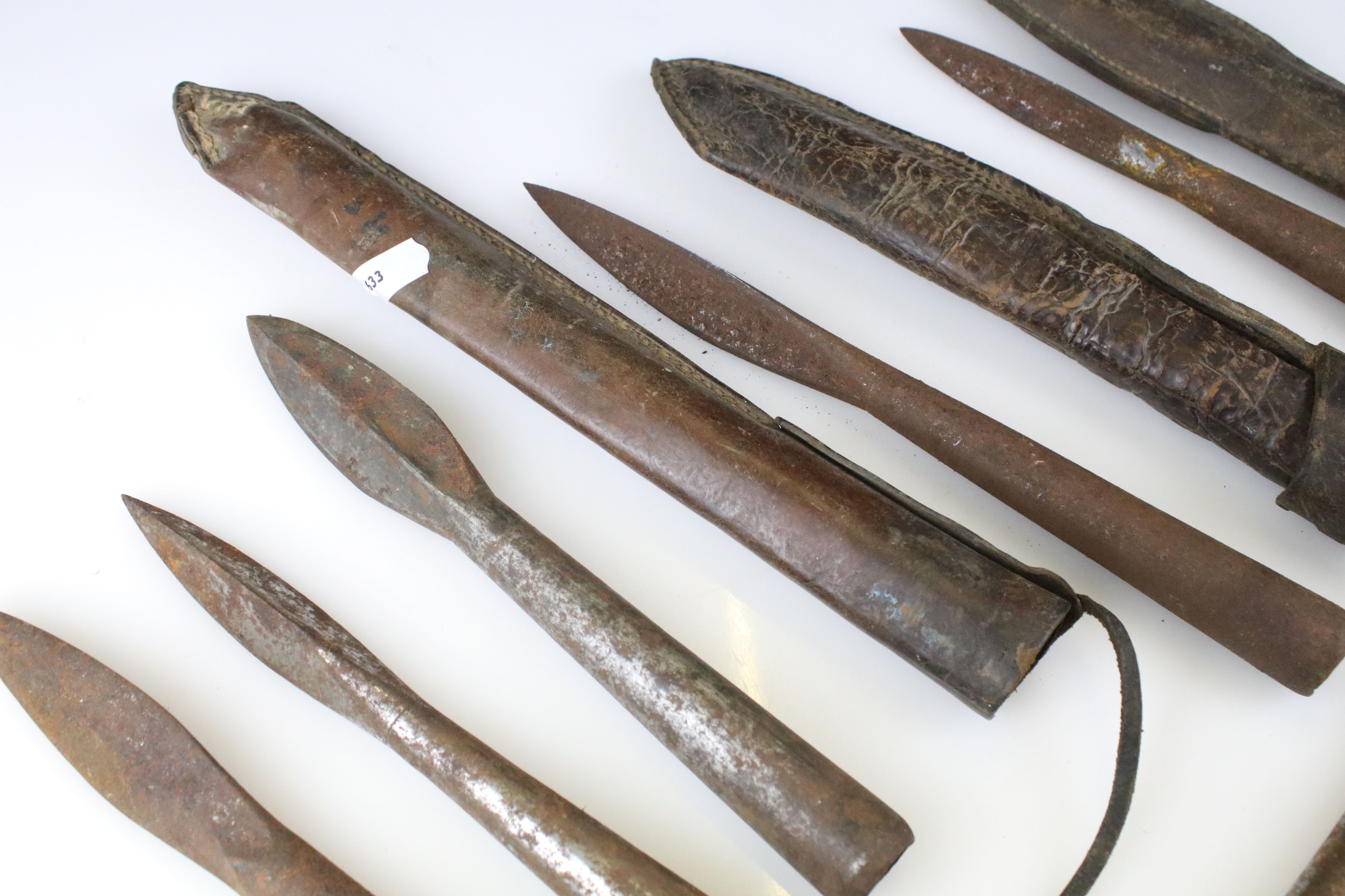 Group of seven antique / vintage metal spear heads, three in leather sheaths - Image 3 of 5