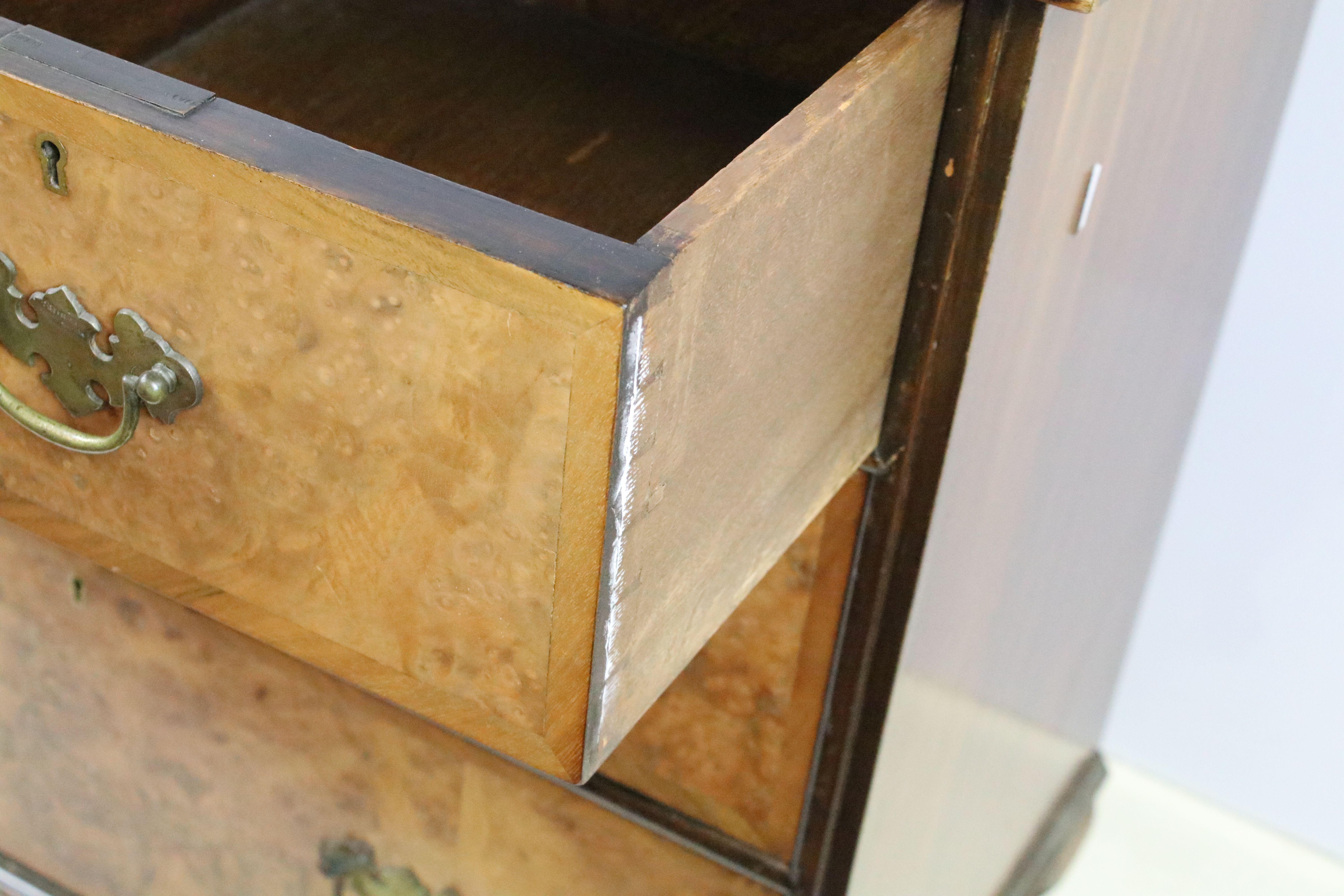 20th Century walnut veneered chest of drawers having two over two drawers with brass swing handles - Image 5 of 8