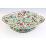 Chinese famille rose celadon glazed footed dish of shaped lozenge form, with bird, flower &