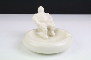 Original Michelin Man Ceramic Ashtray surmounted by a seated Mr Bidendum, 13.5cm wide