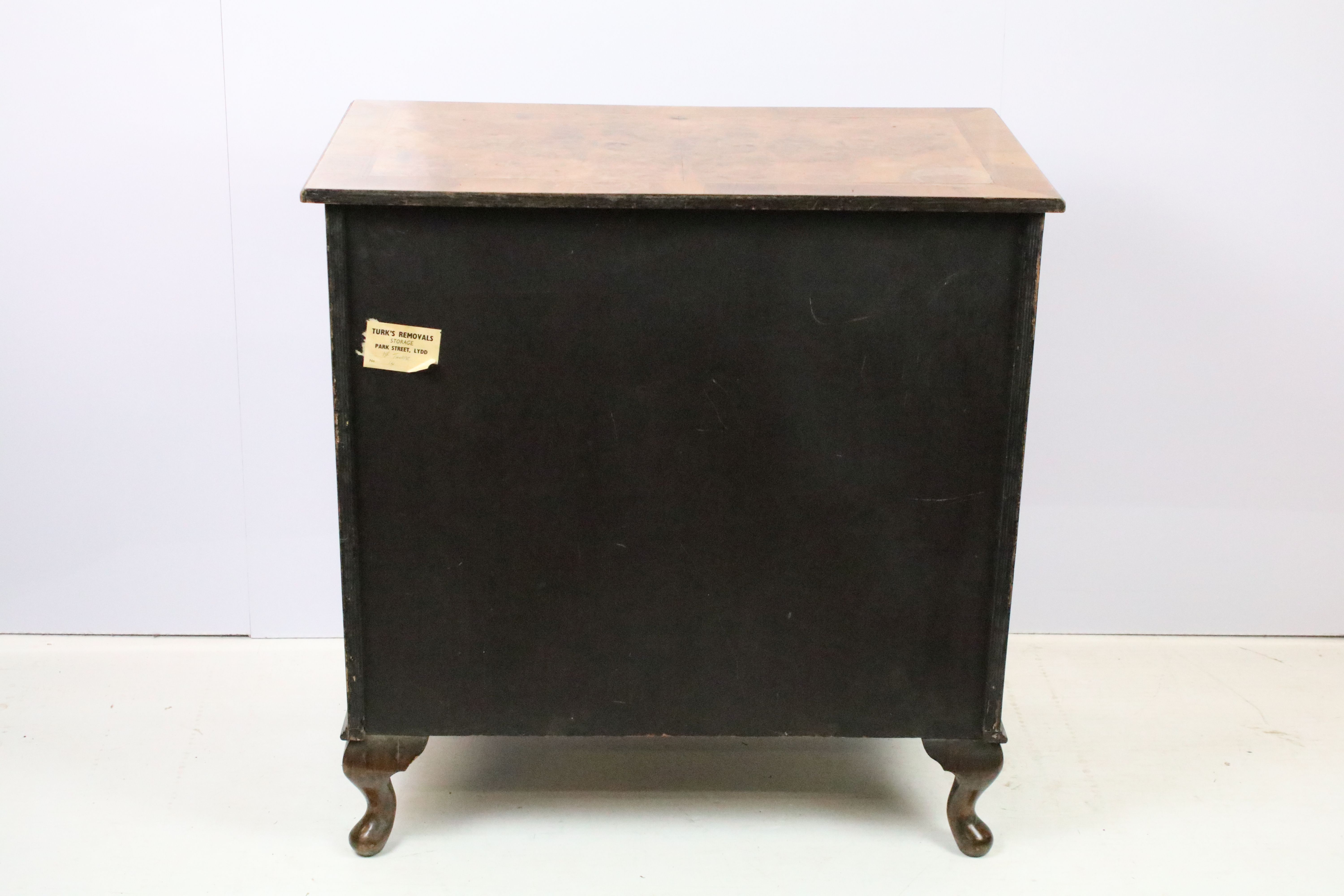 20th Century walnut veneered chest of drawers having two over two drawers with brass swing handles - Image 8 of 8