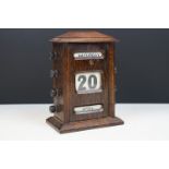 Early 20th century oak desktop perpetual calendar, with day, date & month, approx 17cm tall