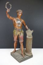 French spelter figure after 'Roger', circa 1900, modelled as a young man standing by a half column