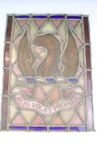 Early 20th century leaded stained glass panel depicting a phoenix, with Latin inscription ' Alis