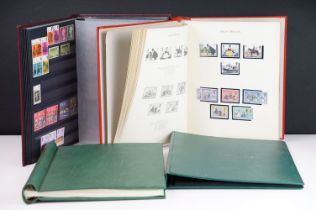 Four albums of British stamps to include two Stanley Gibbons Windsor Albums housing mint stamps, the