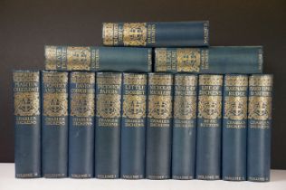 Thirteen volumes of Charles Dickens published in London by the Caxton publishing co.