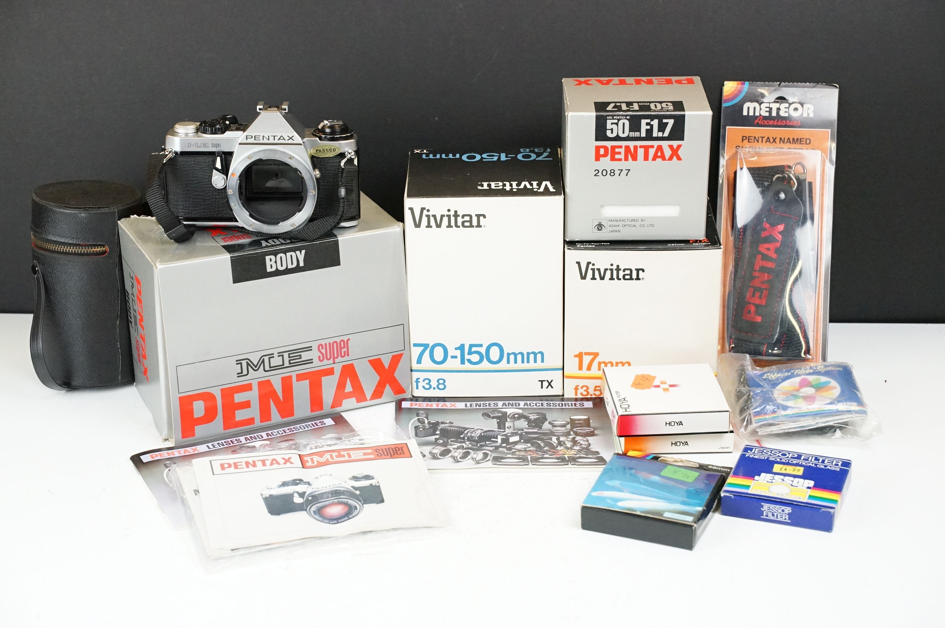 Boxed Pentax ME Super camera, together with a quantity of lenses & accessories to include Vivitar