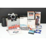 Boxed Pentax ME Super camera, together with a quantity of lenses & accessories to include Vivitar