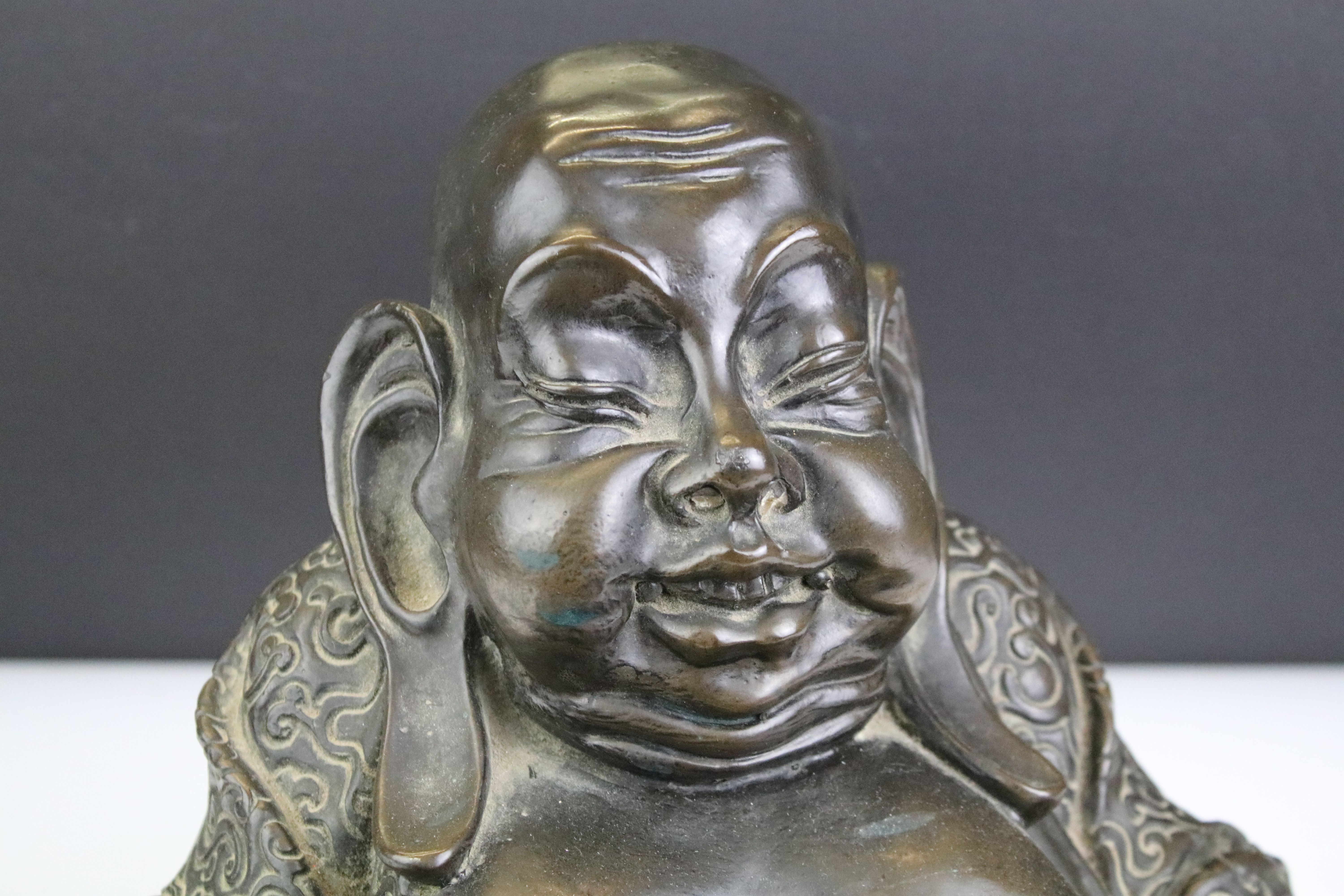 Large cast resin laughing Buddha figurine modelled seated in the lotus position. Measures 25cm tall. - Image 2 of 4