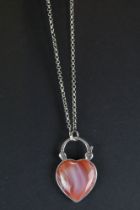 Silver heart shaped pendant necklace set with rose quartz