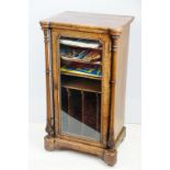 19th Century Victorian inlaid walnut music cabinet having a glass panelled door to front housed