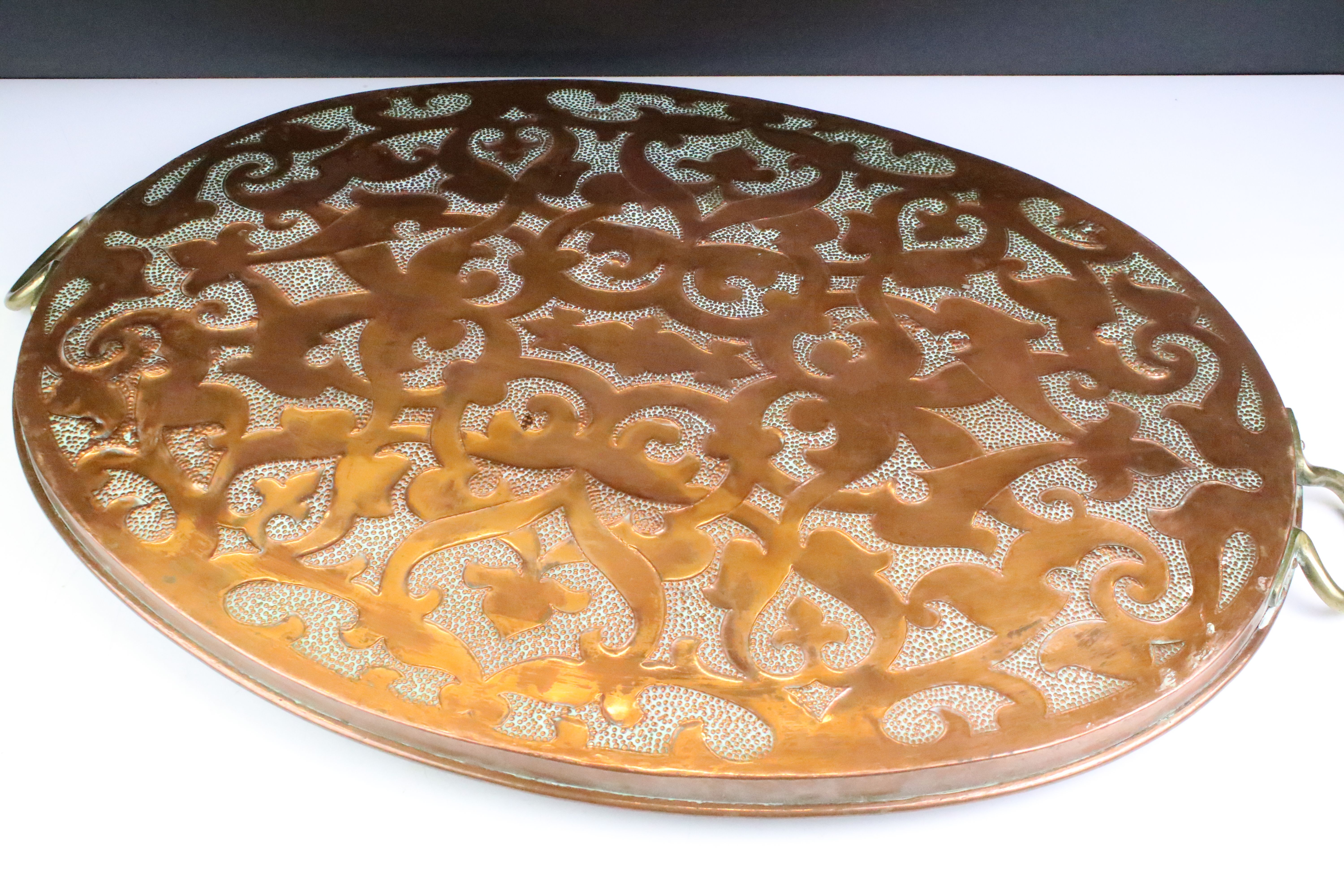 Early 20th Century hammered copper tray having stylised hammered detailing to tray and twin brass - Image 4 of 4