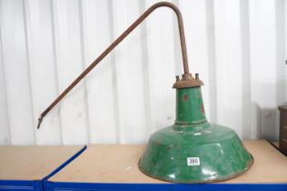 A mid century industrial green enamel lamp by Revo.