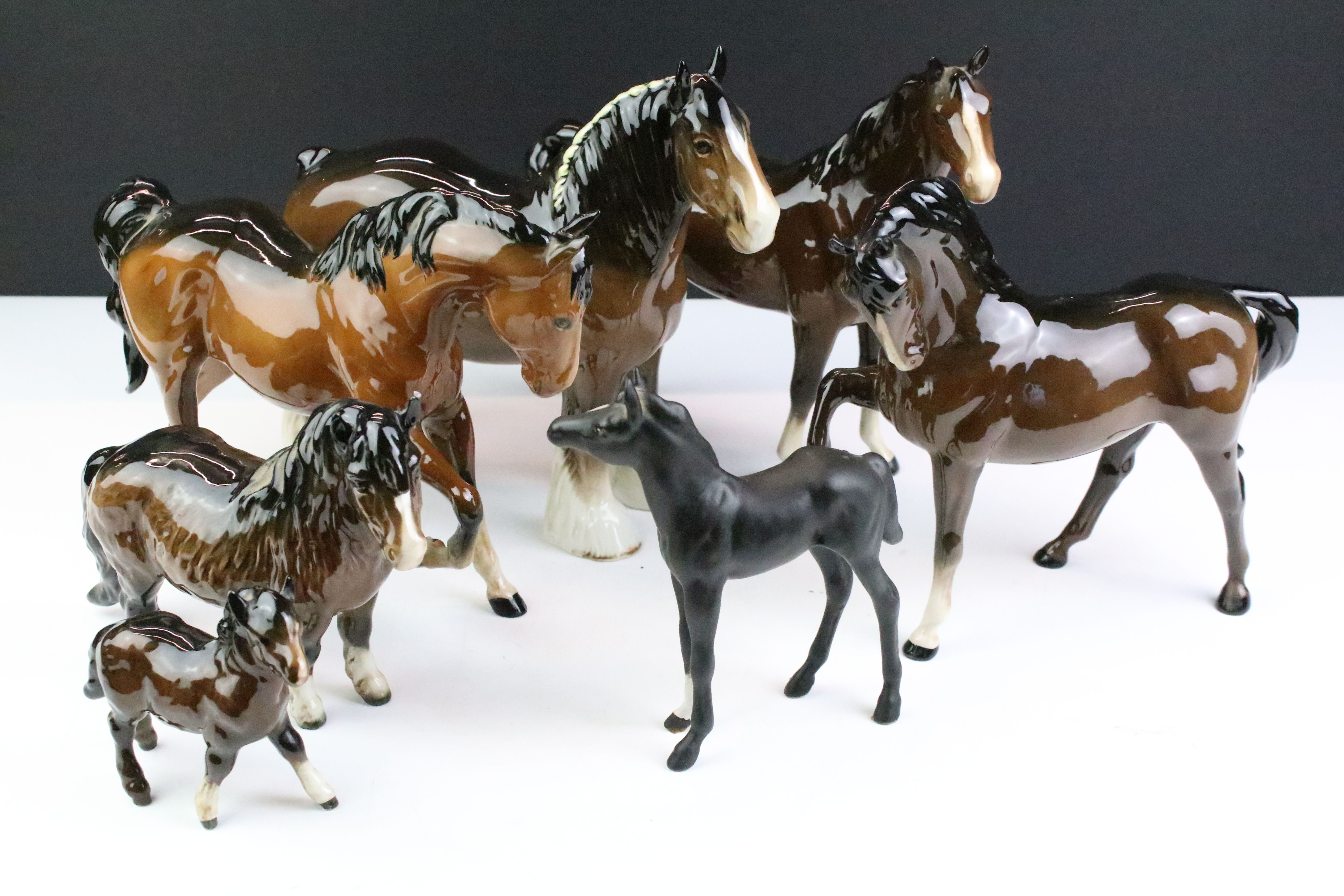 Collection of seven Beswick porcelain horses / ponies to include six brown gloss examples and a matt