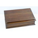 19th Century wooden bible box having a sloped top. Measures 70cm wide.