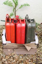 Three 20L metal jerry cans, approx 46cm high
