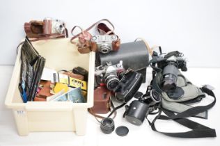 Collection of cameras to include Minolta x-300 with a Kiron 28-210mm lens, Carl Zeiss Jena DDR 1:3.5