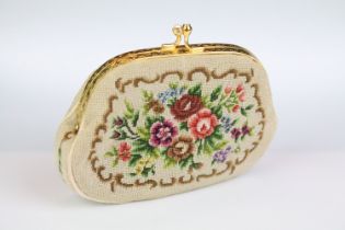 Mid 20th century needlework ladies coin purse with floral decoration and gilt metal clasp,