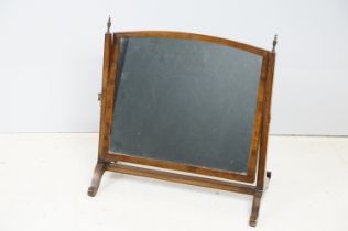 19th Century Victorian mahogany framed swing mirror having finial topped supports with scrolled