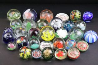 32 Glass paperweights, some with butterflies, swans, various colours & sizes